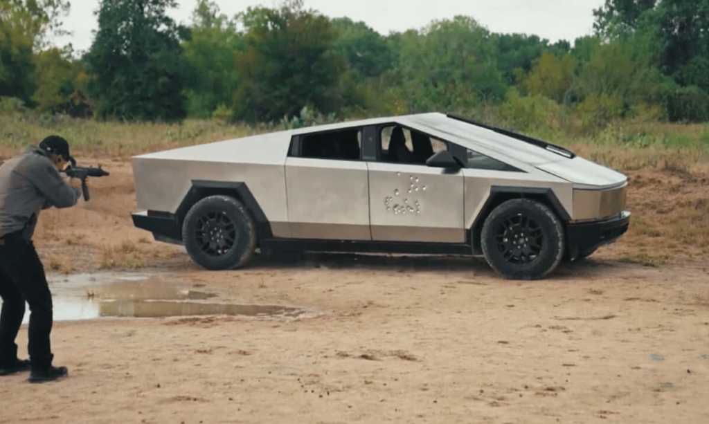 tesla robot shooting cybertruck