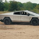 tesla robot shooting cybertruck